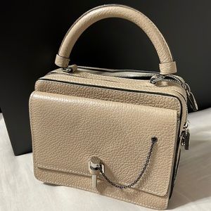 Leather Carven handbag cream color.